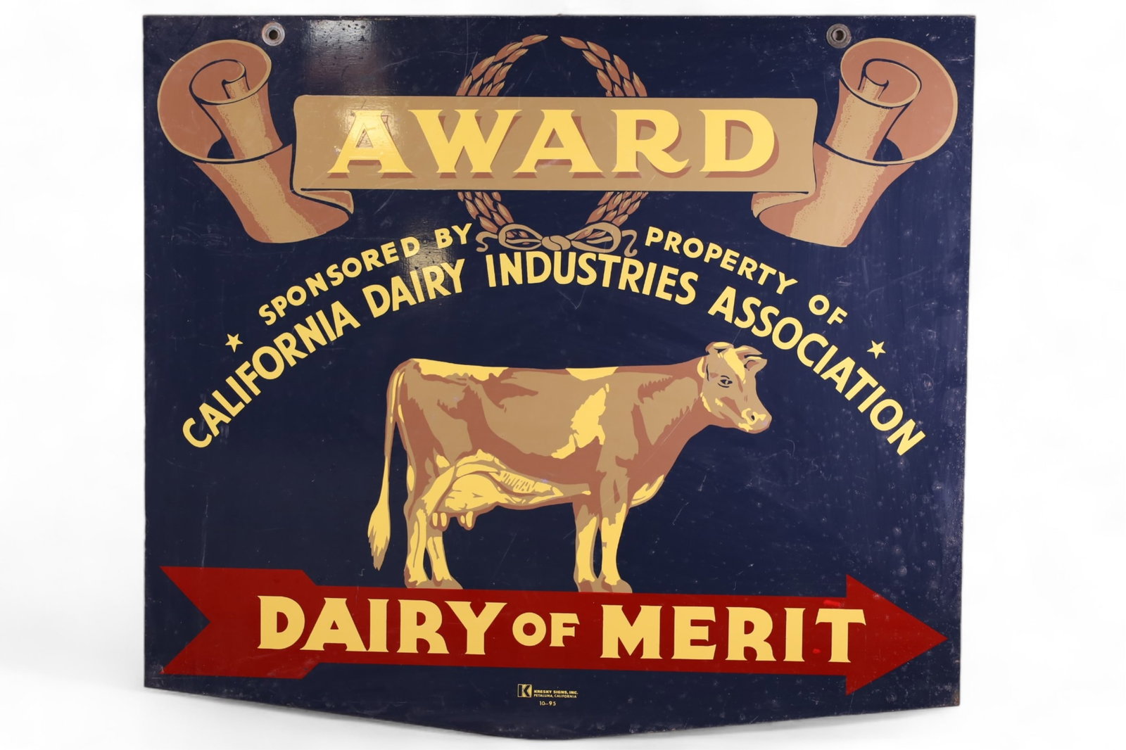DAIRY OF MERIT TIN SIGN: DAIRY OF MERIT TIN SIGN DST DAIRY OF MERIT SIGN, CALIFORNIA DAIRY ASSOC. SURFACE SCRATCHES. 25" x 22"