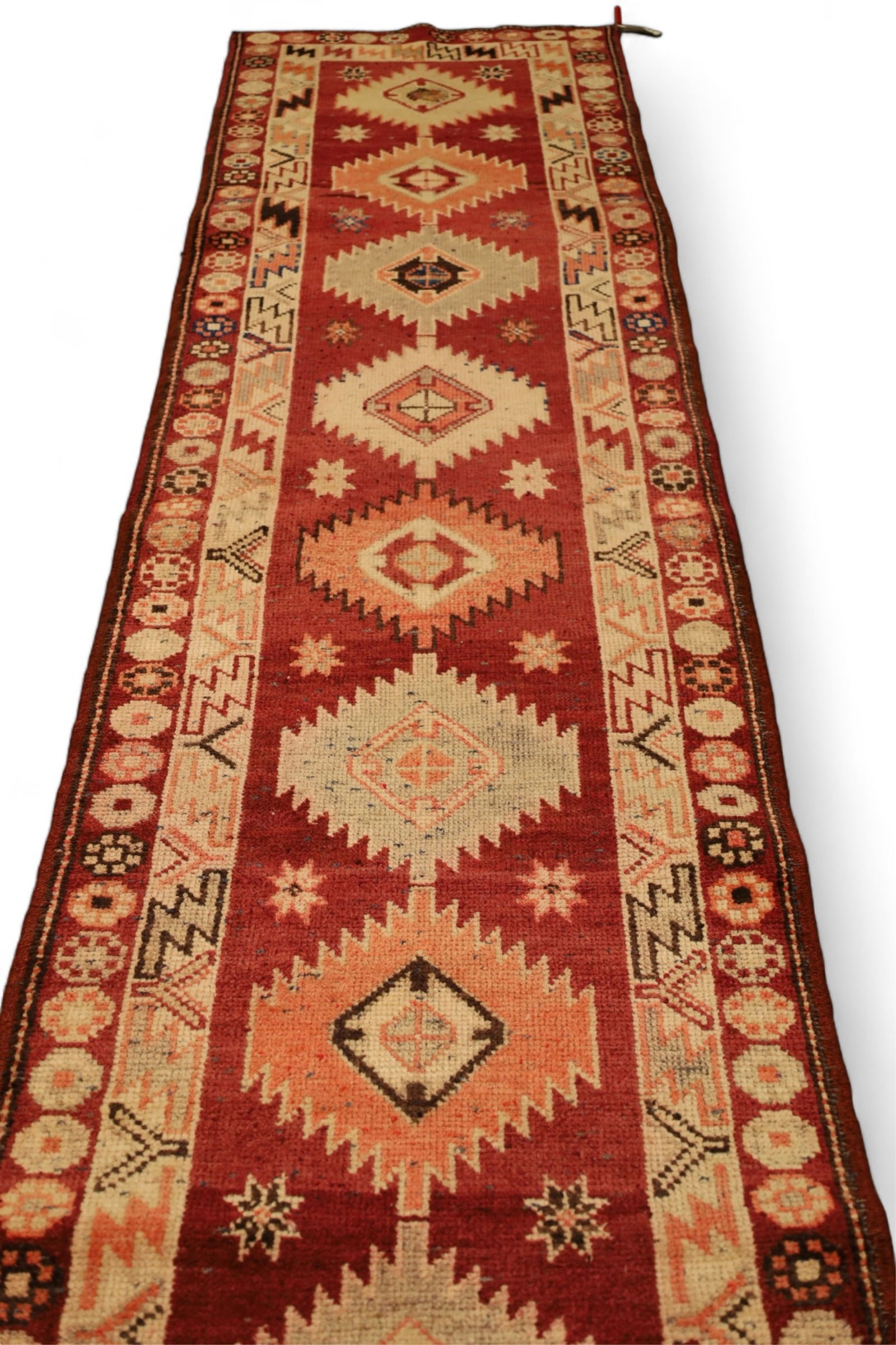 APPROX 12' 5" x 2' 8" HANDMADE WOOL RUG (1 of 3)