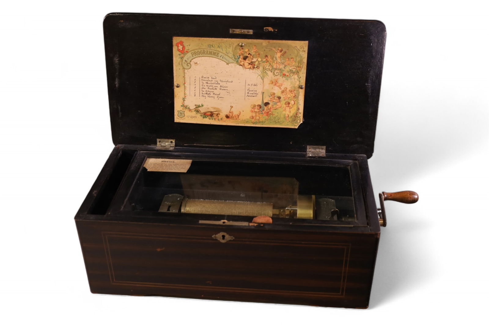 INLAID CYLINDER ROLL MUSIC BOX: SWISS CYLINDER ROLL MUSIC BOX IN INLAID CASE, SINGLE COMB, 8 SONG MUSIC BOX. WITH CRANK. TESTED AND WORKING. 17" W.