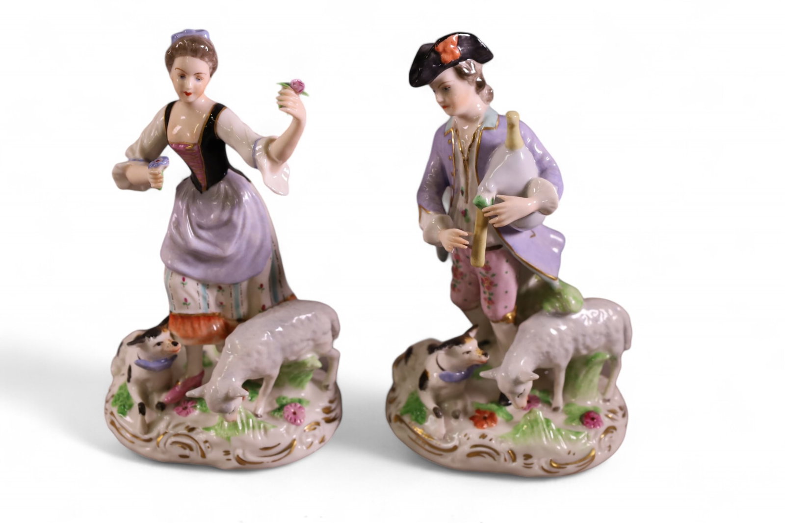 PAIR OF MEISSEN FIGURES: MEISSEN PORCELAIN FIGURES, MARKED ON BASE. MALE HAS BROKEN FINGER. 6 1/2" H