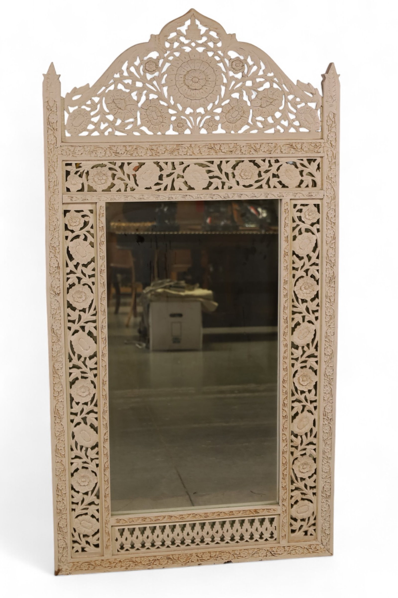 CARVED INDONESIAN WALL MIRROR: PAINTED FINISH, CARVED WALL MIRROR. SOME PAINT LOSS. 29" W x 55" H. THIS ITEM EXCEEDS SIZE LIMITATIONS FOR IN HOUSE SHIPPING, MUST BE SHIPPED VIA 3rd PARTY GROUND SHIPPER OR PICKED UP IN HOUSE.