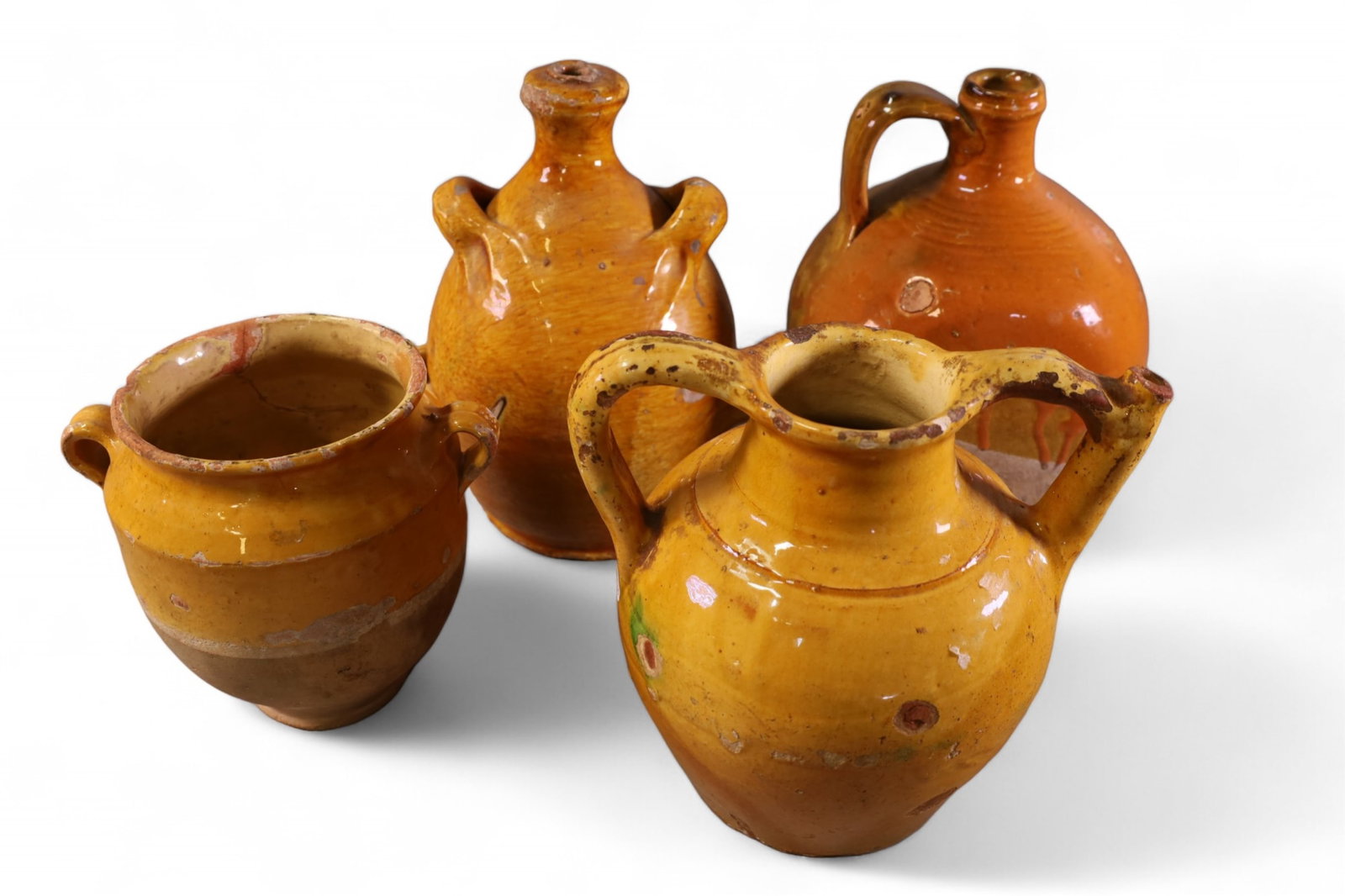 4 PIECES OF FRENCH POTTERY: 4 ANTIQUE FRENCH POTTERY JUGS, SOME CHIPS. 7" - 11" H