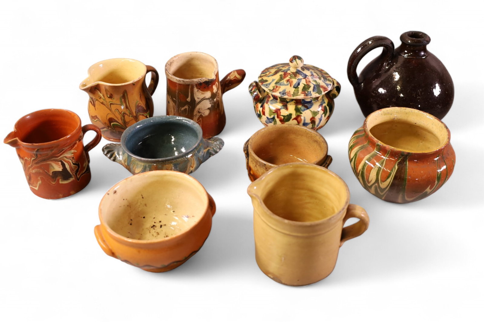 LARGE LOT OF FRENCH POTTERY: 10 PIECES ANTIQUE HAND PAINTED FRENCH POTTERY, BOWLS & CUPS. 2 1/2" - 6" H.