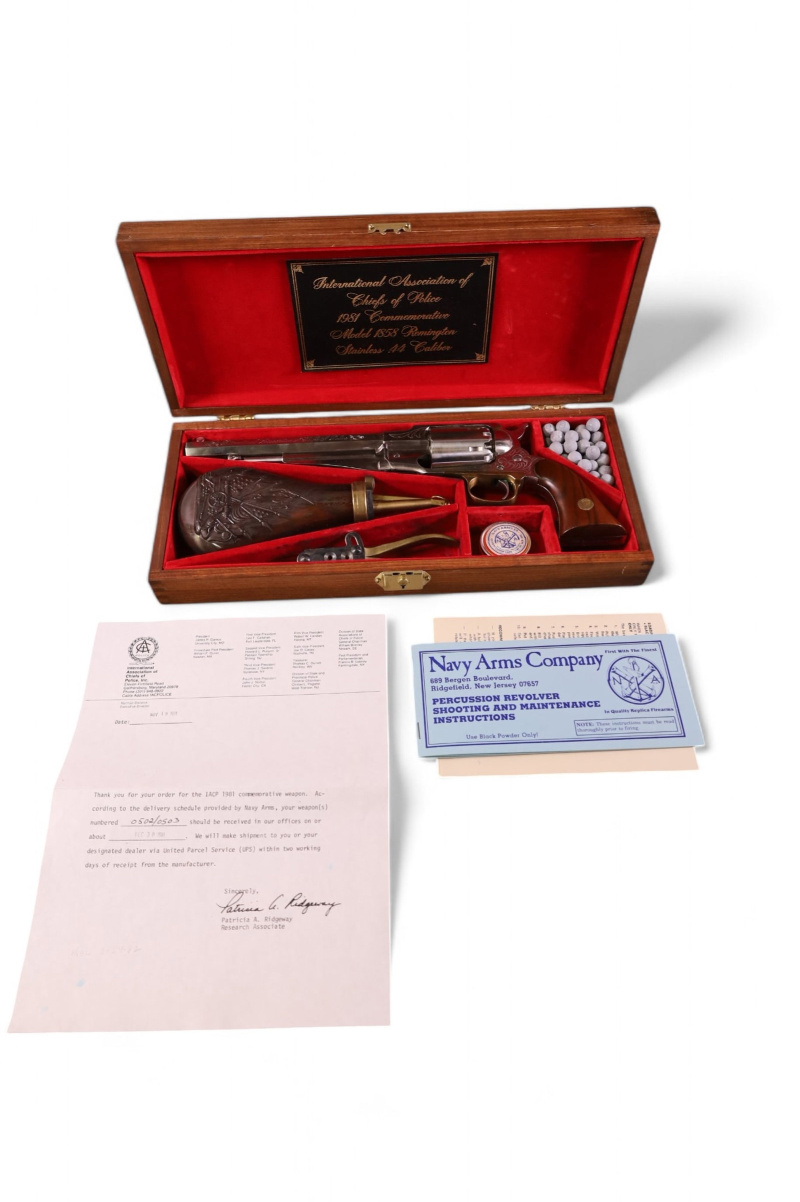 COMMEMORATIVE NAVY ARMS PISTOL: .44 CALIBER, 1981 COMMEMORATIVE, MODEL 1858 REMINGTON, IN PRESENTATION BOX. ENGRAVED INTERNATIONAL ASSOCIATION OF CHIEFS OF POLICE.