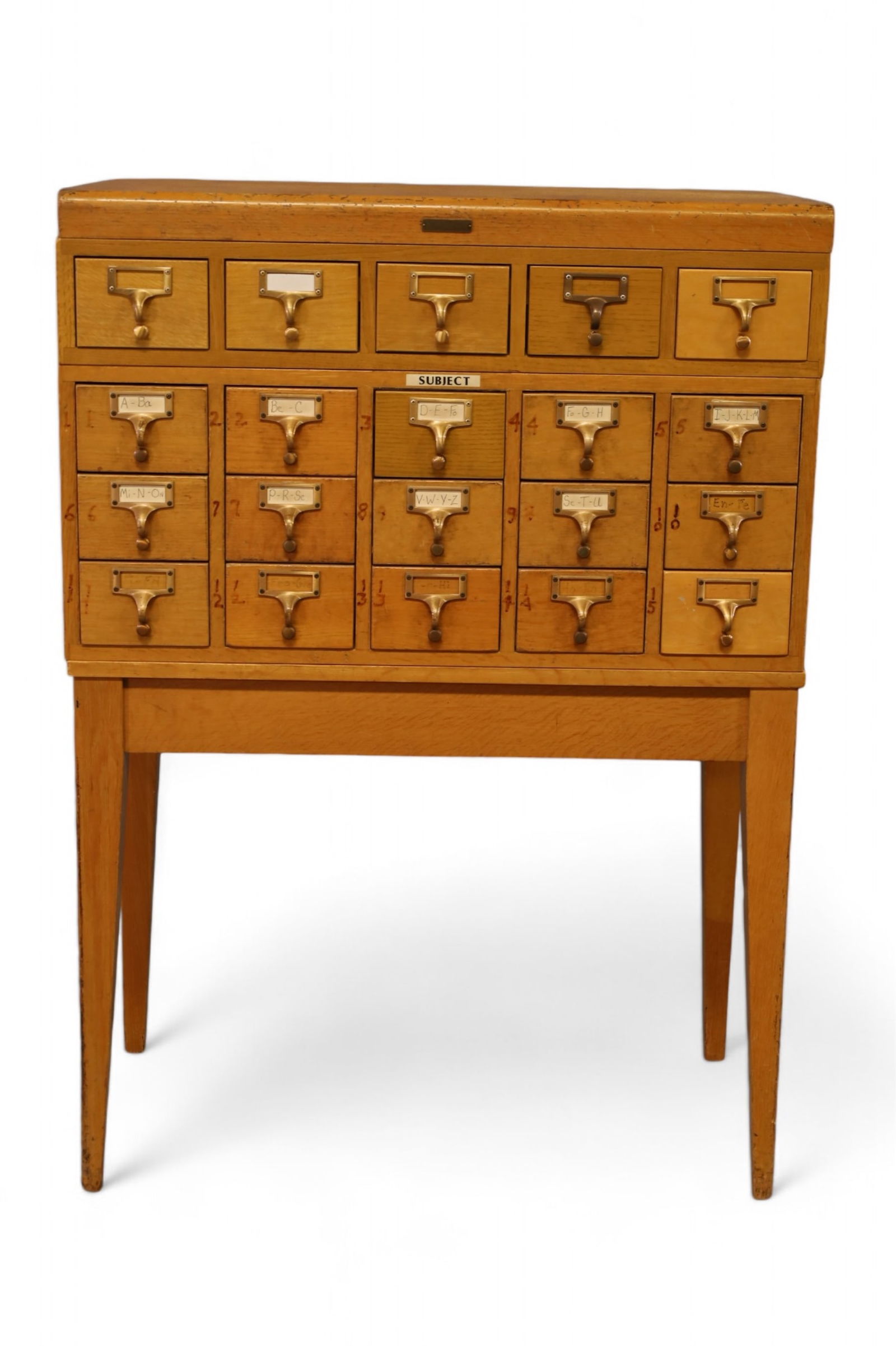 ART DECO CARD FILE: 20 DRAWER ART DECO CARD FILE, WEAR TO FINISH. WRITING ON DRAWER FRONTS. 33" W x 17" D x 47" H. THIS ITEM EXCEEDS SIZE LIMITATIONS FOR IN HOUSE SHIPPING, IT MUST BE SHIPPED VIA 3rd PARTY GROUND SHIPPER