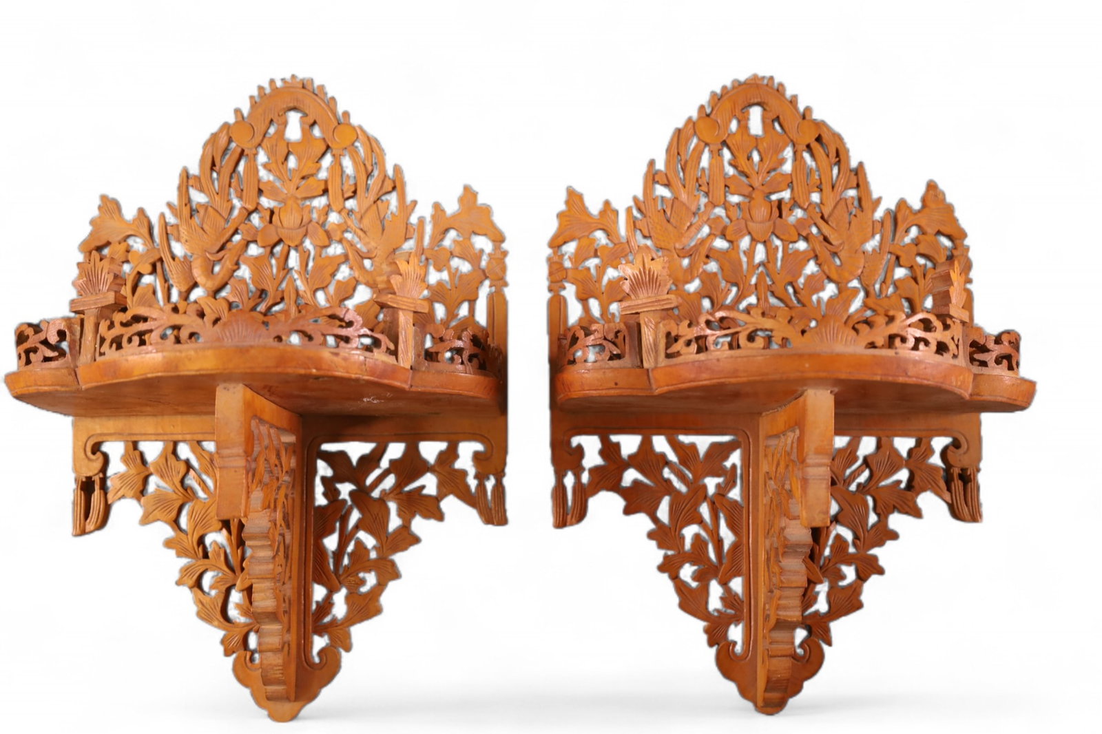 PAIR OF WALL SHELVES: HIGHLY CARVED PIECE CUT WALL SHELVES. 9" W x 13" H.