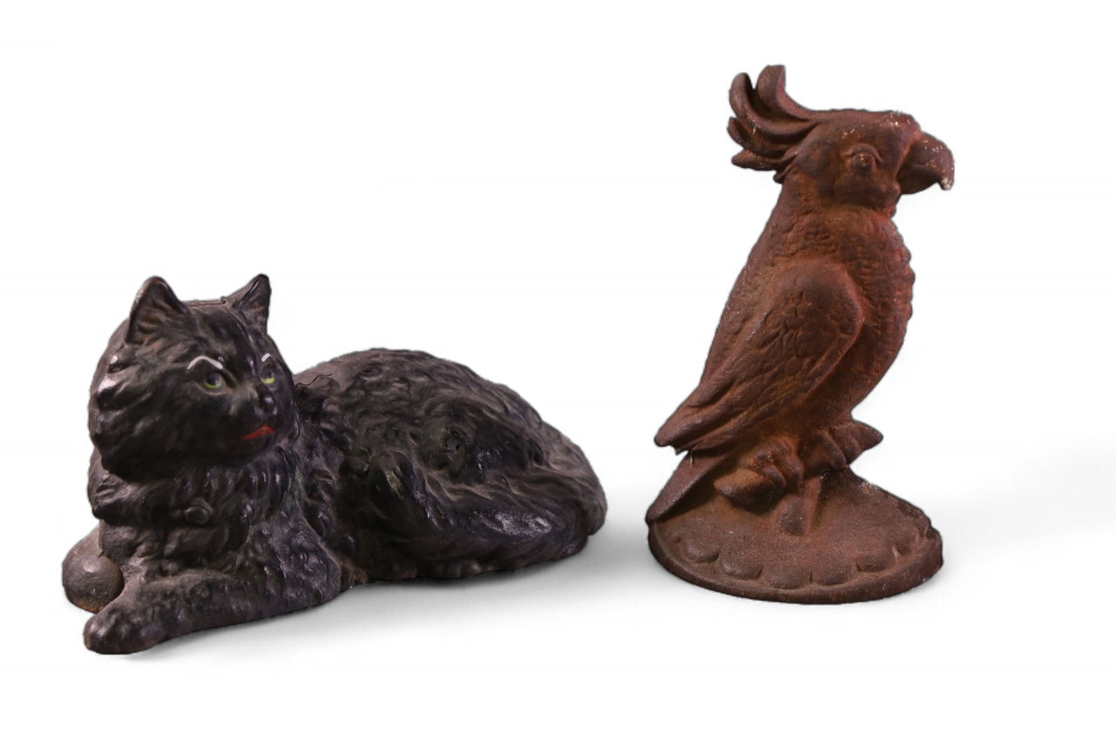 2 CAST IRONS DOORSTOPS: 5 1/2" - 9" H.