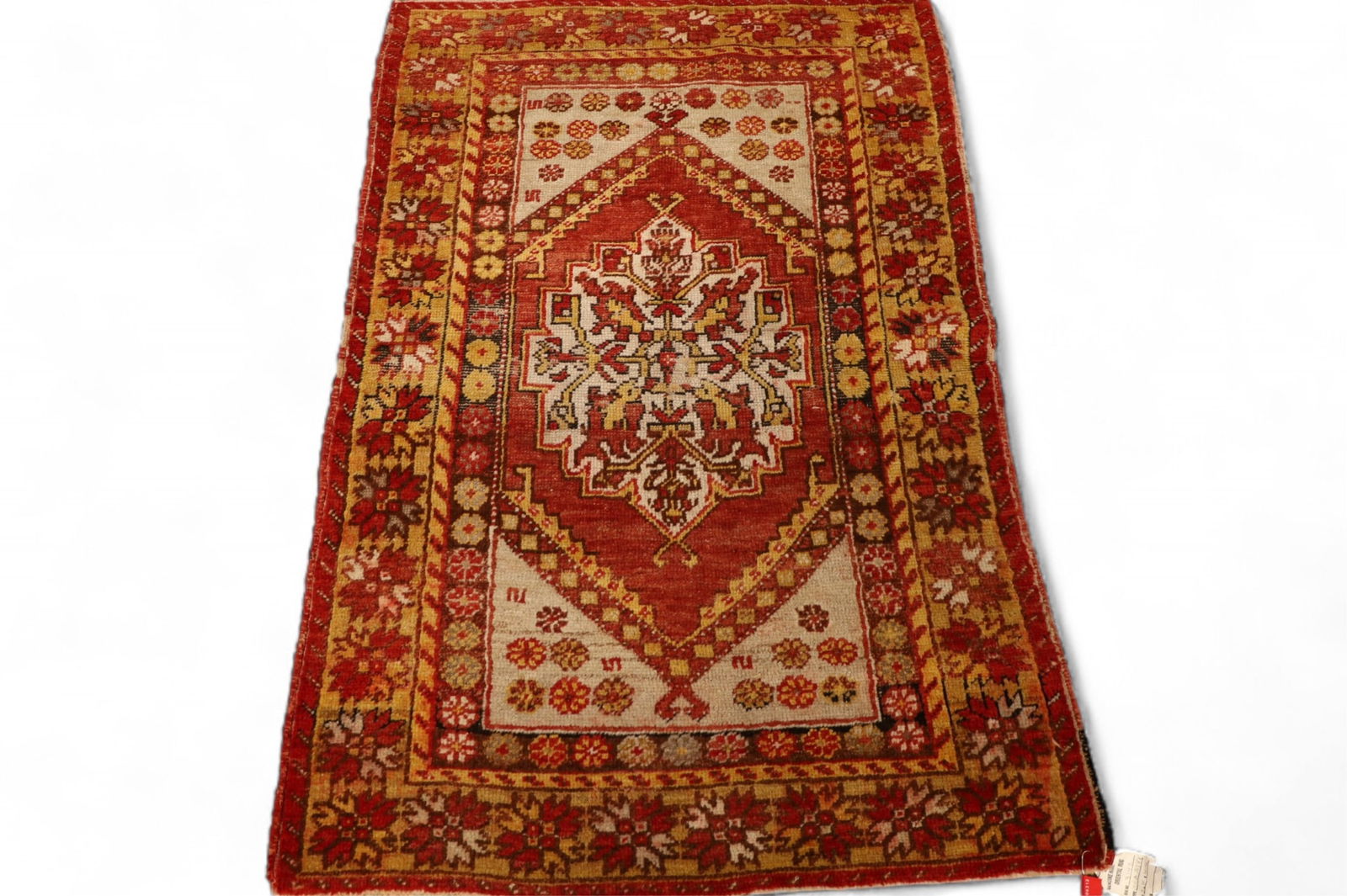 APPROX 2' 10" x 4' 4" HANDMADE WOOL RUG (1 of 2)