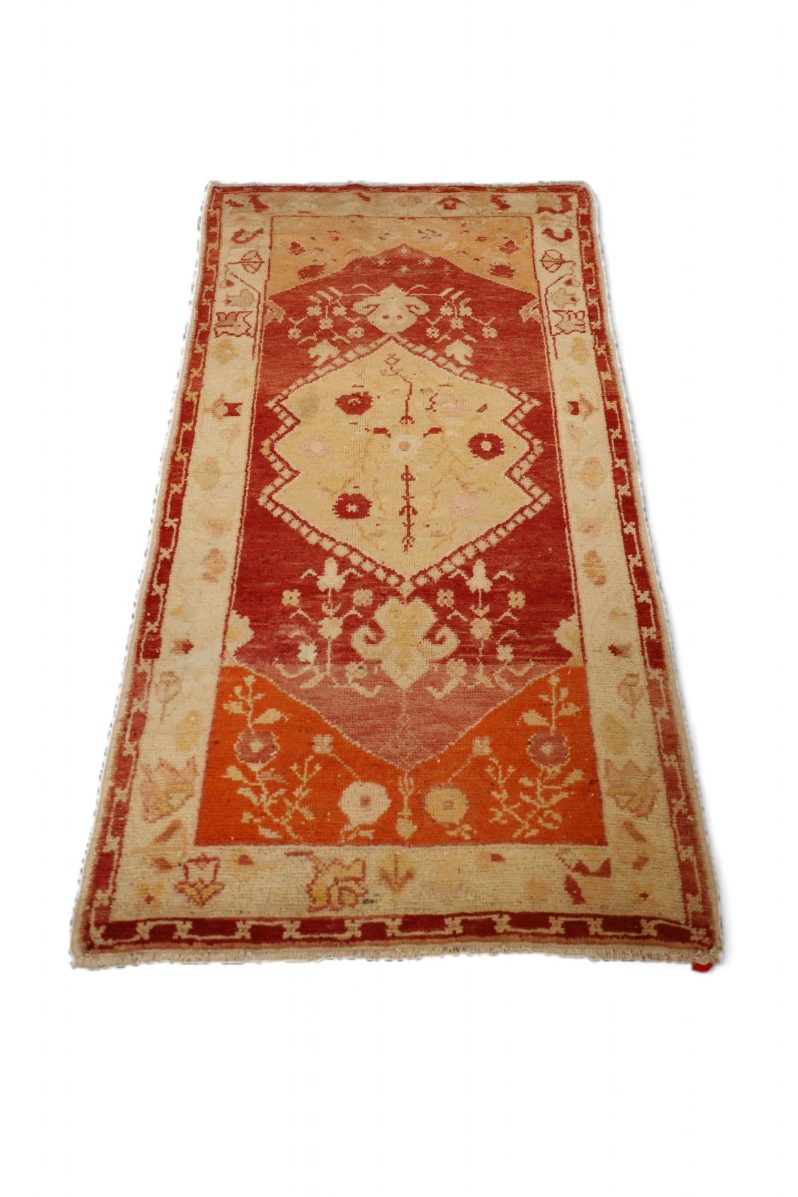 APPROX 5' 4" x 2' 7" HANDMADE WOOL RUG (1 of 3)