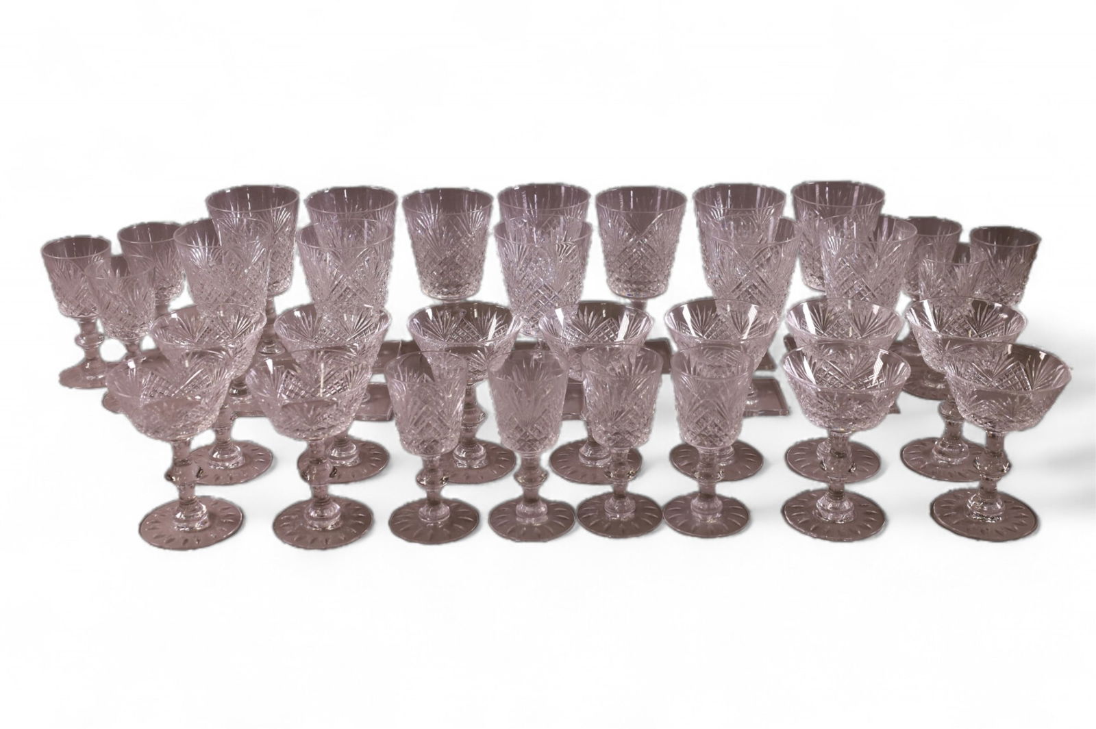 LARGE COLLECTION OF HAWKES CRYSTAL: STRAWBERRY, DIAMOND, FAN CRYSTAL WATER GLASS, WINE GLASSES, CHAMPAGNE GLASSES. APPROX 25 PIECES. SOME CHIPS