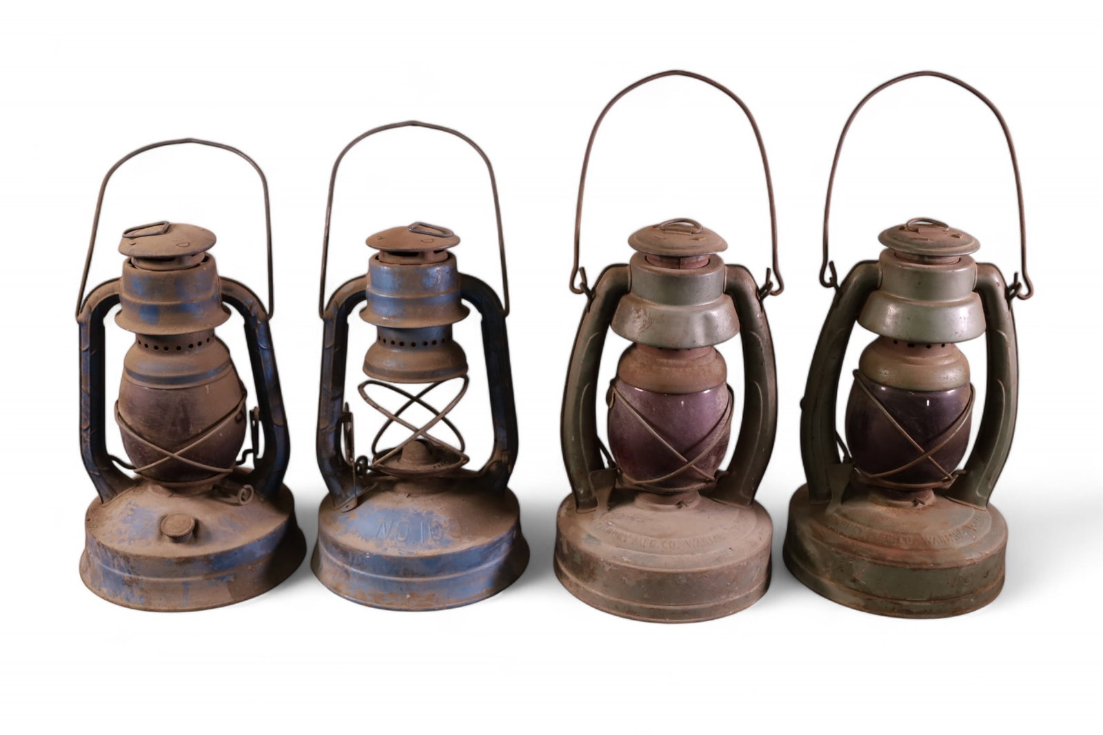 4 ANTIQUE LANTERNS: INCLUDING DIETZ, MISSING ONE GLOBE. 12" H.