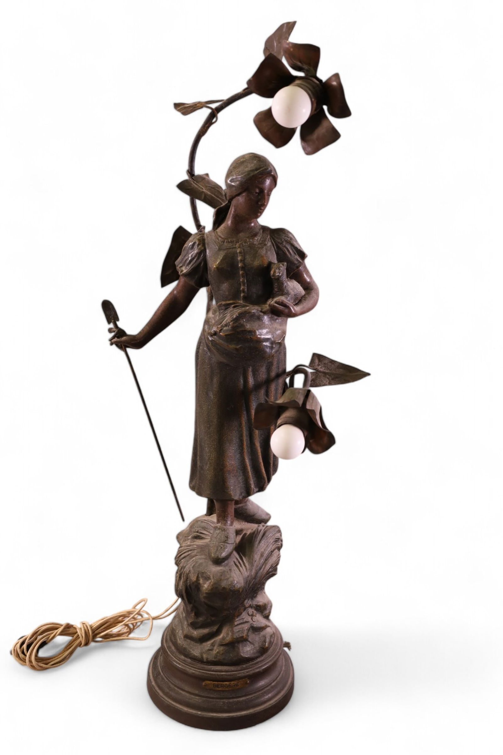 SPELTER LADY LAMP: DOUBLE LIGHT, LARGE SPELTER LADY LAMP. AFTER BERGERE. PITTING TO SURFACE. 30" H. THIS ITEM EXCEEDS SIZE LIMITATIONS FOR IN HOUSE SHIPPING, IT MUST BE SHIPPED VIA 3rd PARTY GROUND SHIPPER OR PICKED UP