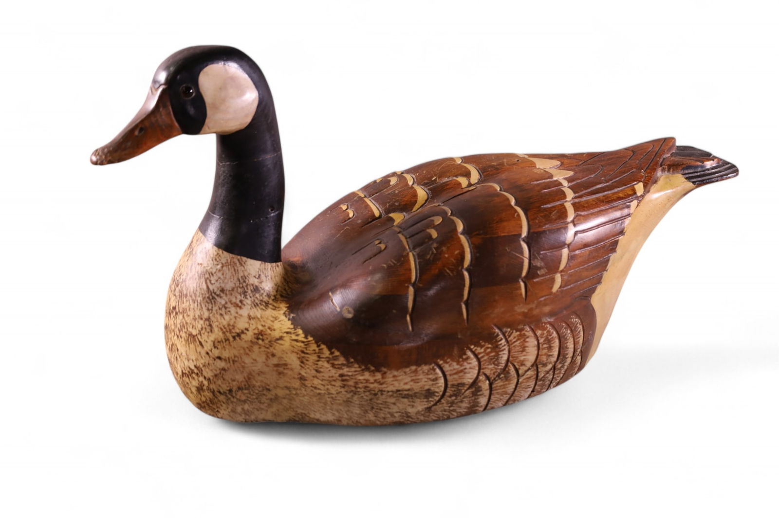 LARGE TOM TABER CARVED DECOY: LARGE CARVED DECOY, SIGNED TOM TABER, HERSEY KYLE JR. DAMAGE TO BEAK & TAIL. . 23" L . 13" H.