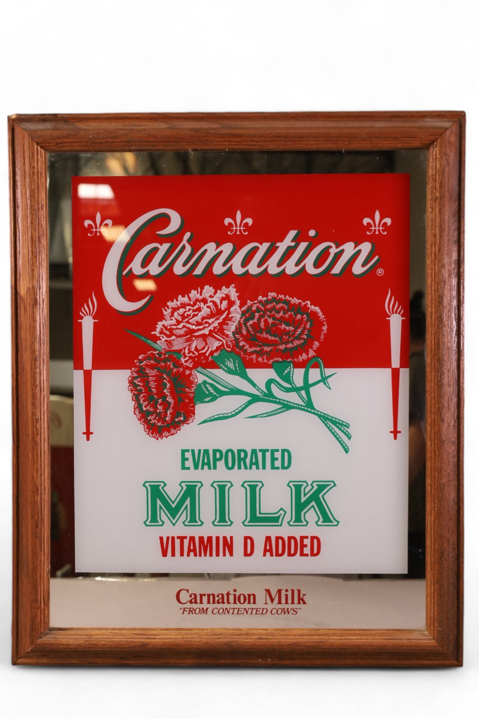CARNATION MIRROR AD: FRAMED MIRROR AD, CARNATION MILK. 18" x 22"