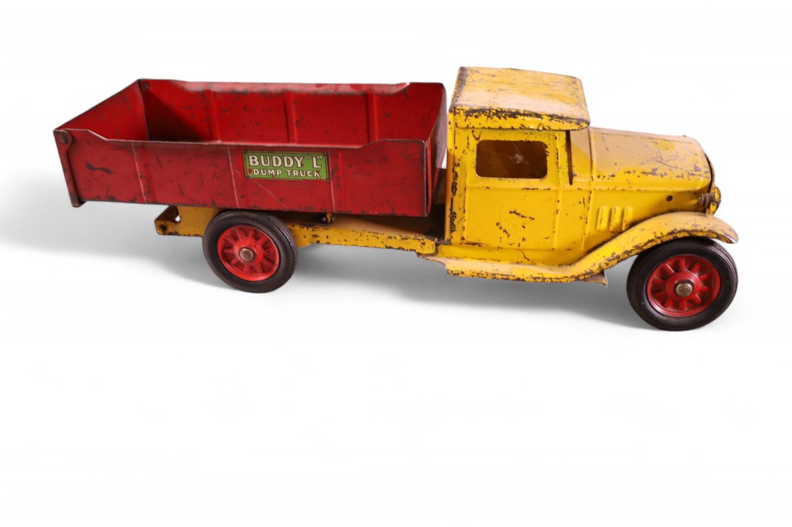 BUDDY L PRESSED STEEL DUMP TRUCK: DUMP TRUCK. 19" L.
