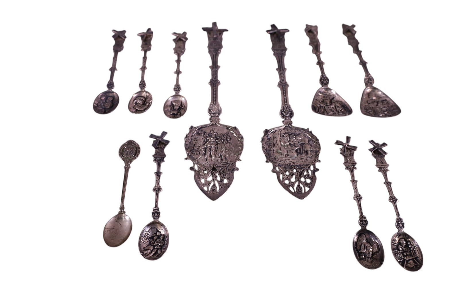 COLLECTION OF DUTCH FLATWARE: 11 PIECES OF DUTCH SILVERWARE, UNTESTED. 5" - 8" L .
