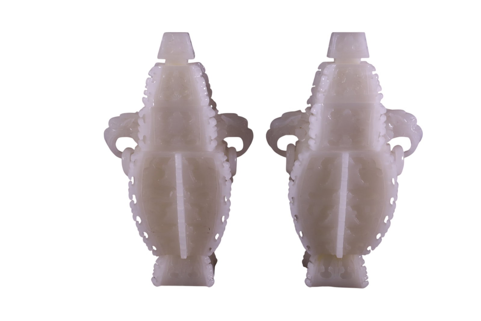 PAIR OF CHINESE HARD STONE LIDDED JARS: WHITE HARD STONE LIDDED JARS, RING AND ELEPHANT HANDLES. 13" H.