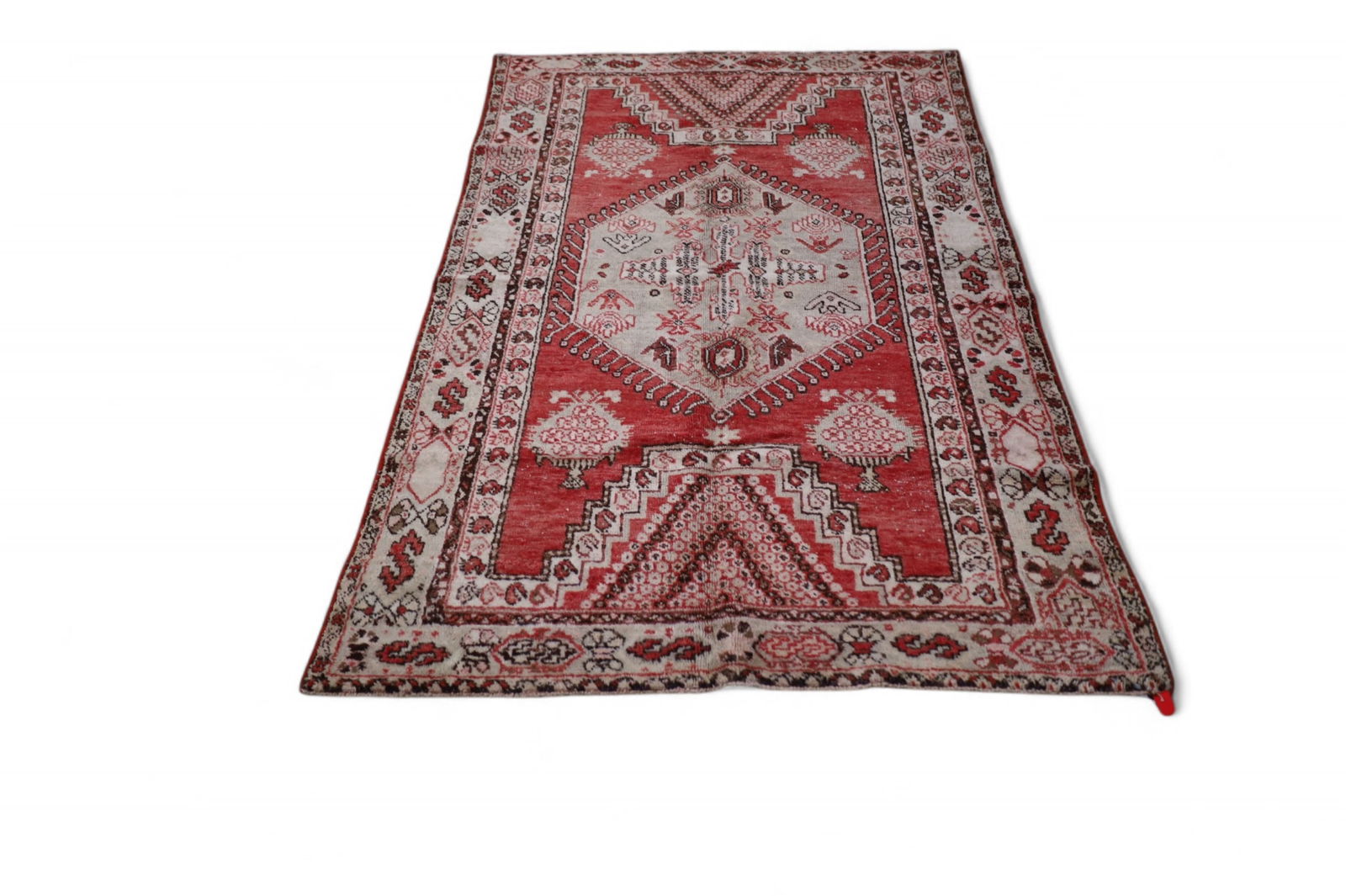 APPROX 6' 8" x 4' 2" HANDMADE WOOL RUG (1 of 3)