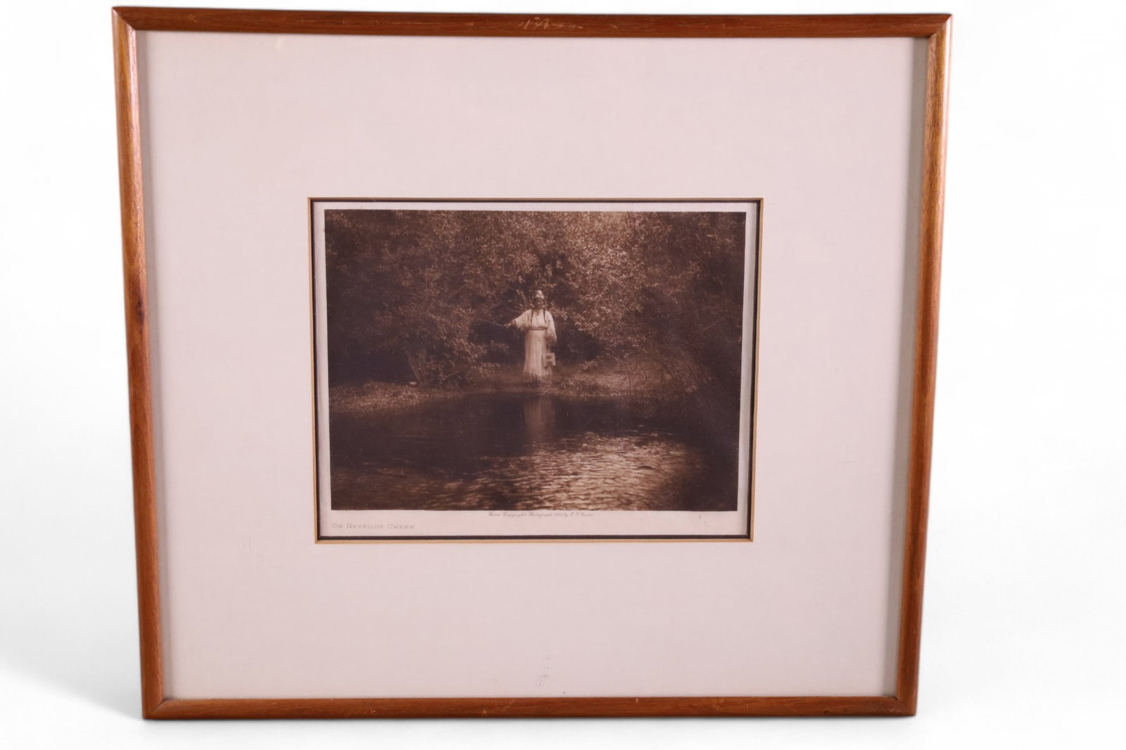 EDWARD CURTIS PHOTOGRAVURE: ON NESPILIM CREEK, DATED 1905. 7 1/2" x 6" IMAGE SIZE / 14" x 12" IN FRAME.