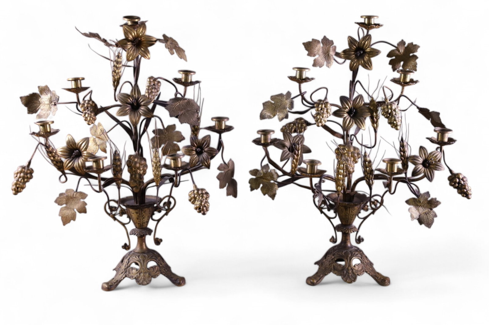 PAIR OF VICTORIAN FLORAL CANDELABRAS: LARGE BRASS CANDELABRAS, FLORAL AND GRAPE DECORATED. 19" W x 25" H. THIS ITEM EXCEEDS SIZE LIMITATIONS FOR IN HOUSE SHIPPING, MUST BE PICKED UP HOUSE OR SHIPPED VIA 3rd PARTY SHIPPER.
