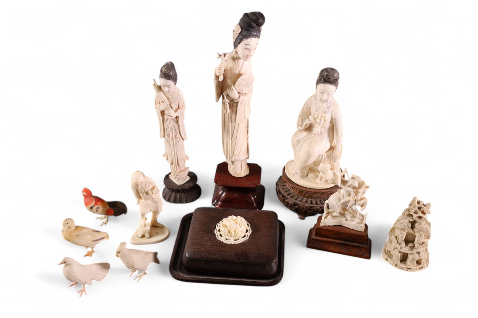 COLLECTION OF CHINESE BONE CARVINGS: CHINESE BONE CARVINGS, 11 PIECES. ON WOODEN STANDS. A COUPLE HAVE MINOR DAMAGE. 2 " - 10 1/2" H