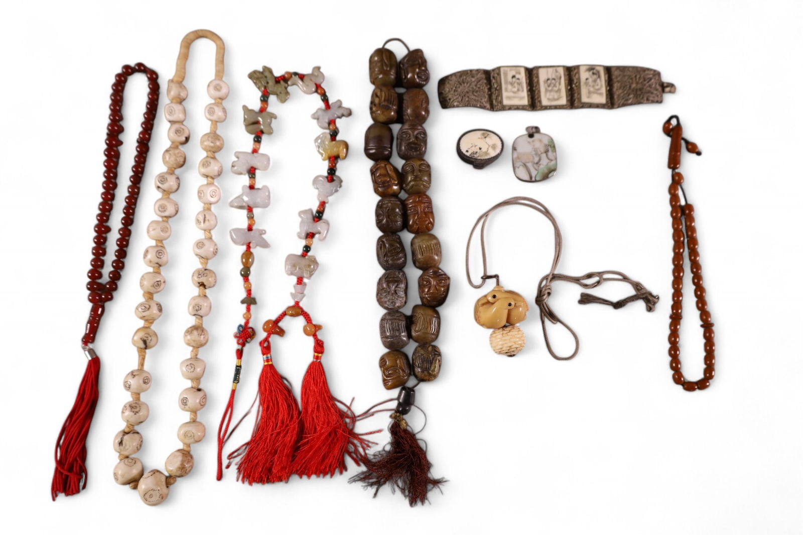 LOT OF ASIAN JEWELRY: CARVED BONE, AMBER AND STONE BEADS, & STONE CARVED FIGURES.