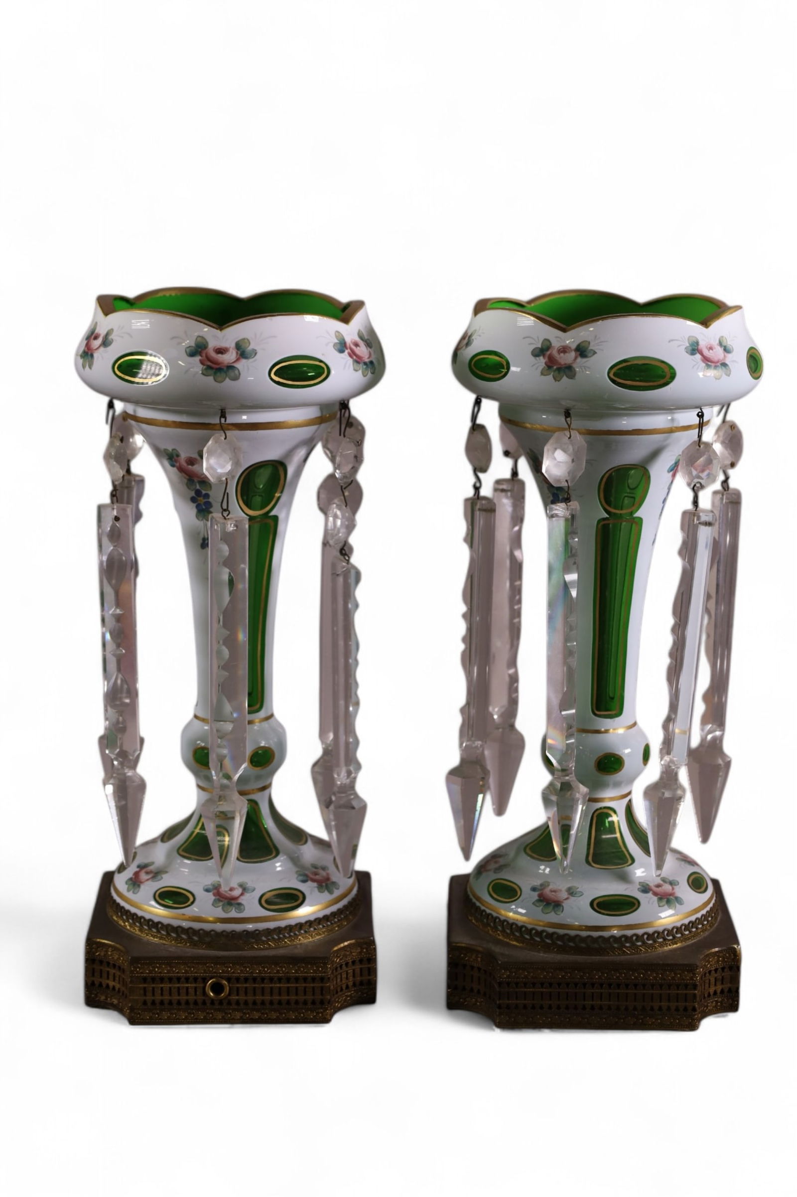 PAIR OF BOHEMIAN MANTLE LUSTERS: PAIR OF EMERALD CUT TO CLEAR BOHEMIAN MANTLE LUSTERS ON BASES. 12" H.