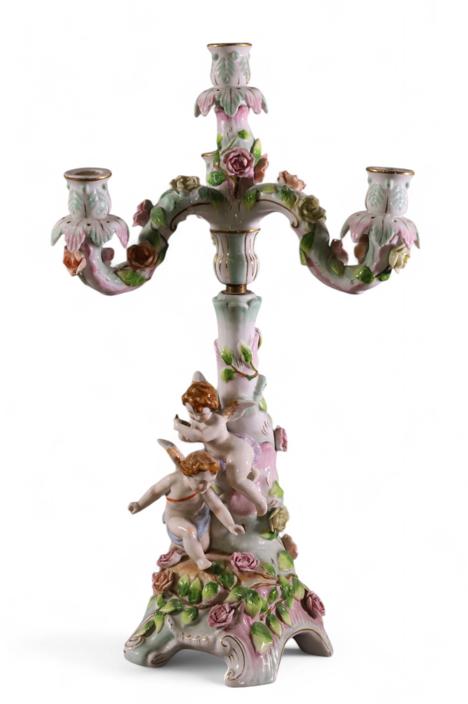 PORCELAIN FIGURAL CANDELABRA: CHERUB FORM PORCELAIN CANDELABRA, CHIPS TO FLOWERS. ONE ARM HAS BEEN REPAIRED. 20" H.