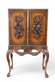 1920'S HIGHLY CARVED TWO DOOR CHINA CABINET
