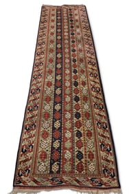 APPROX 9' 7" x 2' 9" HANDMADE WOOL RUG