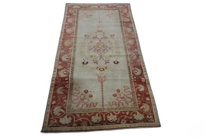 APPROX 6' 3" x 3' 2" HANDMADE WOOL RUG