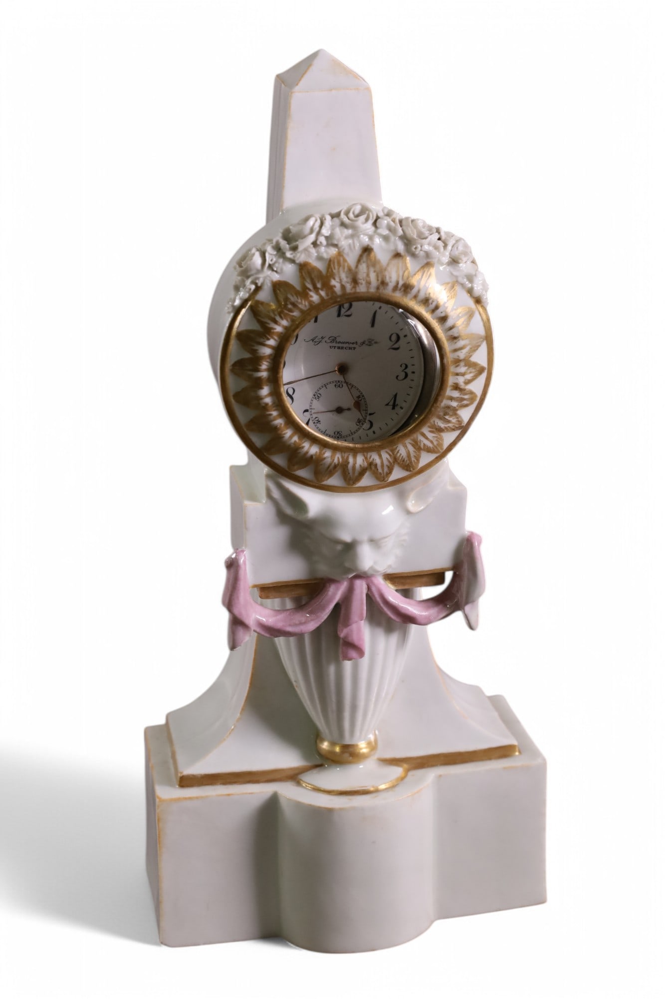 PORCELAIN WATCH HOLDER: PORCELAIN POCKET WATCH HOLDER, WITH POCKET WATCH FACE IS LOOSE. ALL WATCHES ARE SOLD AS IS WE DO NOT GUARANTEE WORKING ORDER. 10" H.