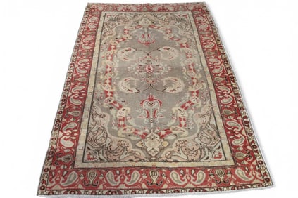 APPROX 4' 3" x 6' 2" HANDMADE WOOL RUG