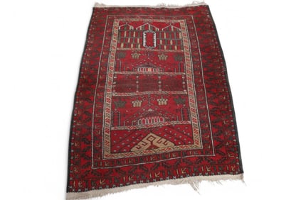 APPROX 4' 4" x 2' 10" HANDAMDE WOOL RUG