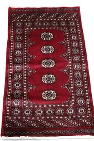 APPROX 4' 4" x 2' 6" HANDMADE RUG