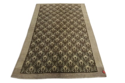 APPROX 6' 1" x 4' 2" HANDMADE WOOL RUG
