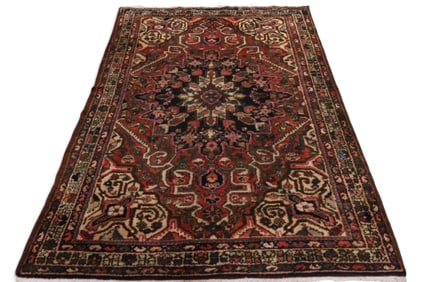 APPROX 5' 2" x 7' 1" HANDMADE WOOL RUG
