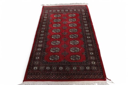 APPROX 5' 8" x 3' 7" HANDMADE WOOL RUG