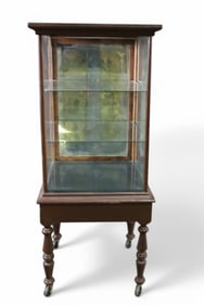 ANTIQUE NARROW SHOWCASE ON LEGS