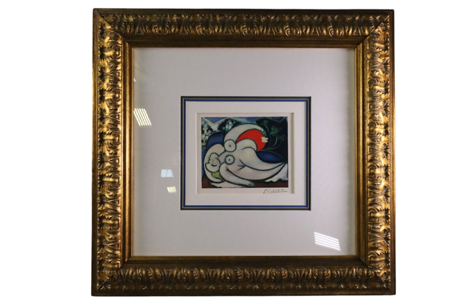 PABLO PICASSO RECLINING NUDE PRINT: SIGNED LOWER RIGHT. RECLINING NUDE OR SLEEPING LADY. CERTIFICATE OF AUTHENTICITY 9" X 8" IMAGE SIZE/28" X 26 1/2" FRAME