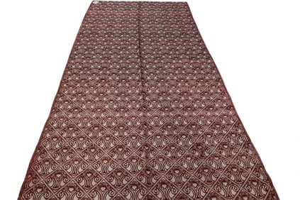 APPROX 10' 2" x 4' 8" HANDMADE WOOL RUG