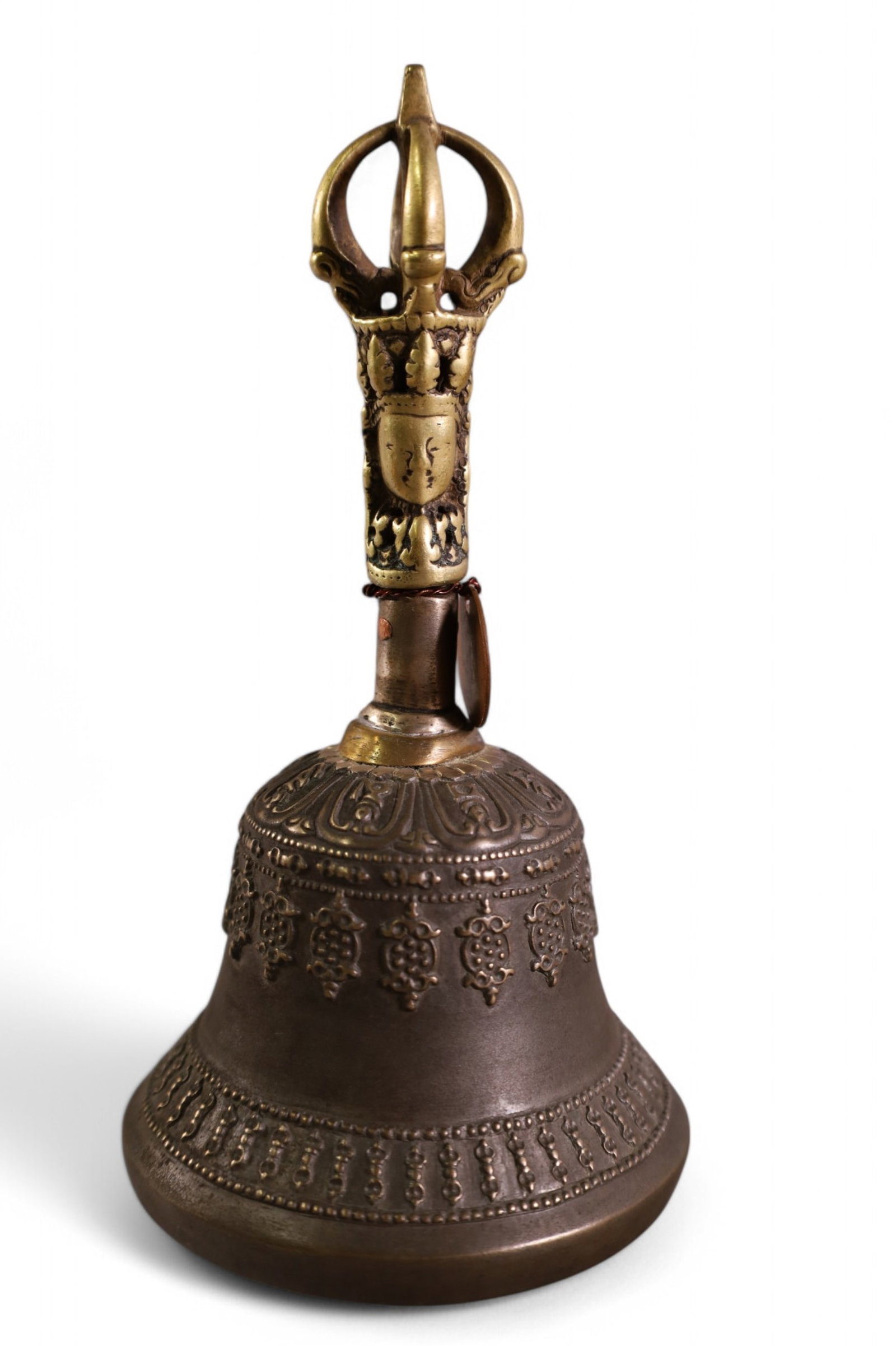 12TH CENTURY DILBUH LAMA BELL FROM TIBET: DOLMA THE GODDESS OF MERCY. VERY WORN ON HANDLE. HAS METAL TAG 185 FROM THE MISSION INN RIVERSIDE CALIFORNIA. 7 1/2" TALL X 3 3/4" DIAMETER
