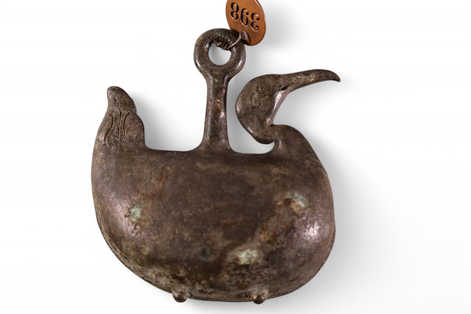 JAPANESE DUCK SHAPED BRONZE BELL: HAS METAL TAG 398 FROM MISSION INN RIVERSIDE CALIFORNIA. DUG UP FROM AN OLD MONUMENT IN A TEMPLE CEMETERY AT KYOTO JAPAN. 4 1/2" X 4" WIDE