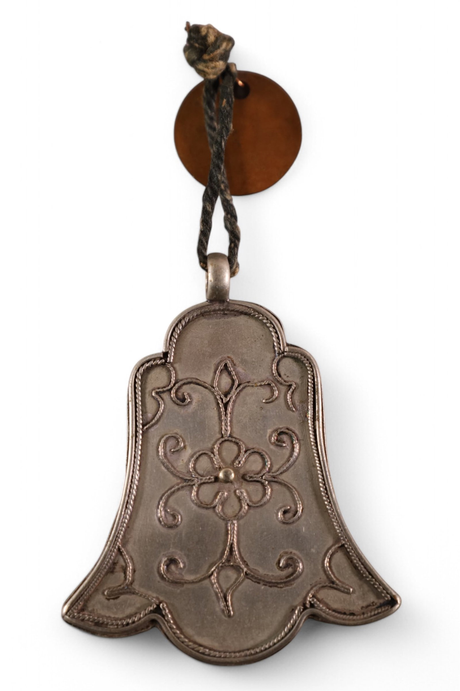 CHINESE SILVER BELL PENDANT: LOTUS SHAPE WITH APPLIED SILVER WIRE DECORATIONS. HAS METAL TAG 628 FROM MISSION INN RIVERSIDE CALIFORNIA. 2 1/2" X 2"