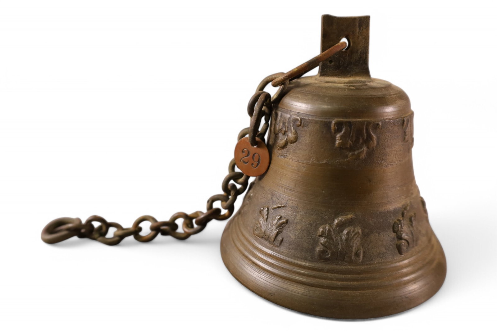 15TH CENTURY ITALIAN BRONZE BELL: 15th C BRONZE BELL, ITALIAN, FLOREATED ORNAMENTATION IN RELIEF, MARKED WITH METAL TAG, 29 FROM MISSION INN RIVERSIDE CALIFORNIA. 4 3/4" H x 4 1/2" DIAM.