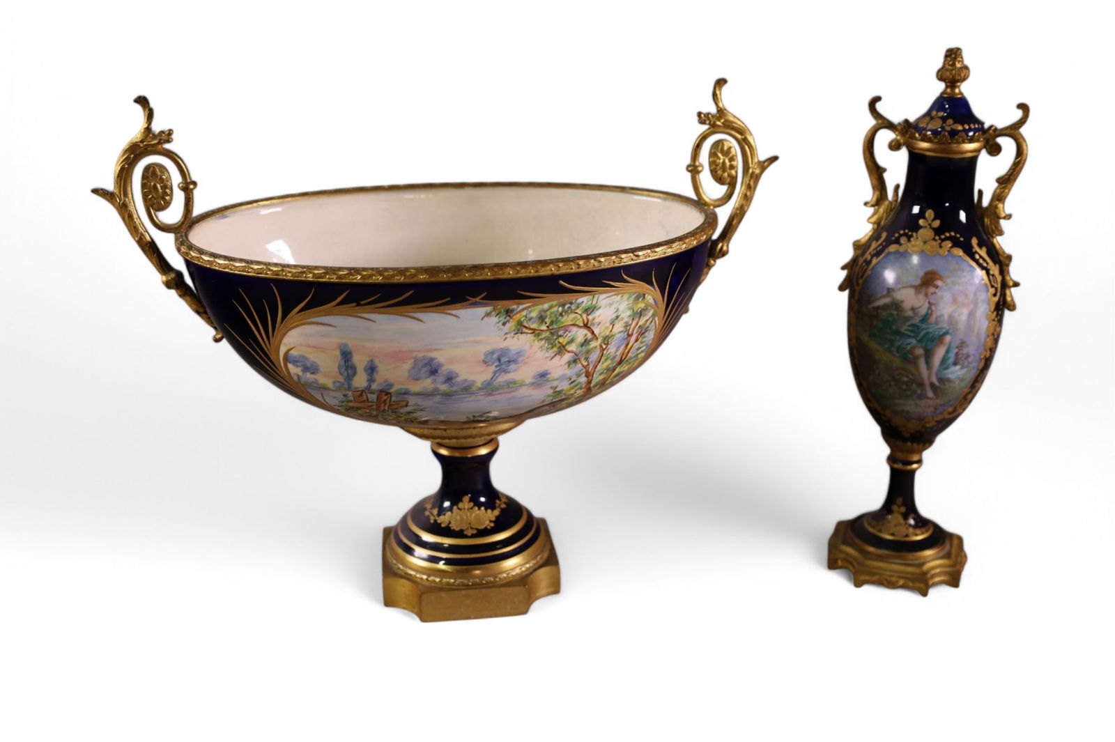 2 PIECES OF FRENCH SEVRES STYLE PORCELAIN: LIDDED URN & FOOTED CENTER PIECE, ARTIST SIGNED GILLES LIDDE URN, 11" H.. 12" W x 10" H. CENTER PIECE.