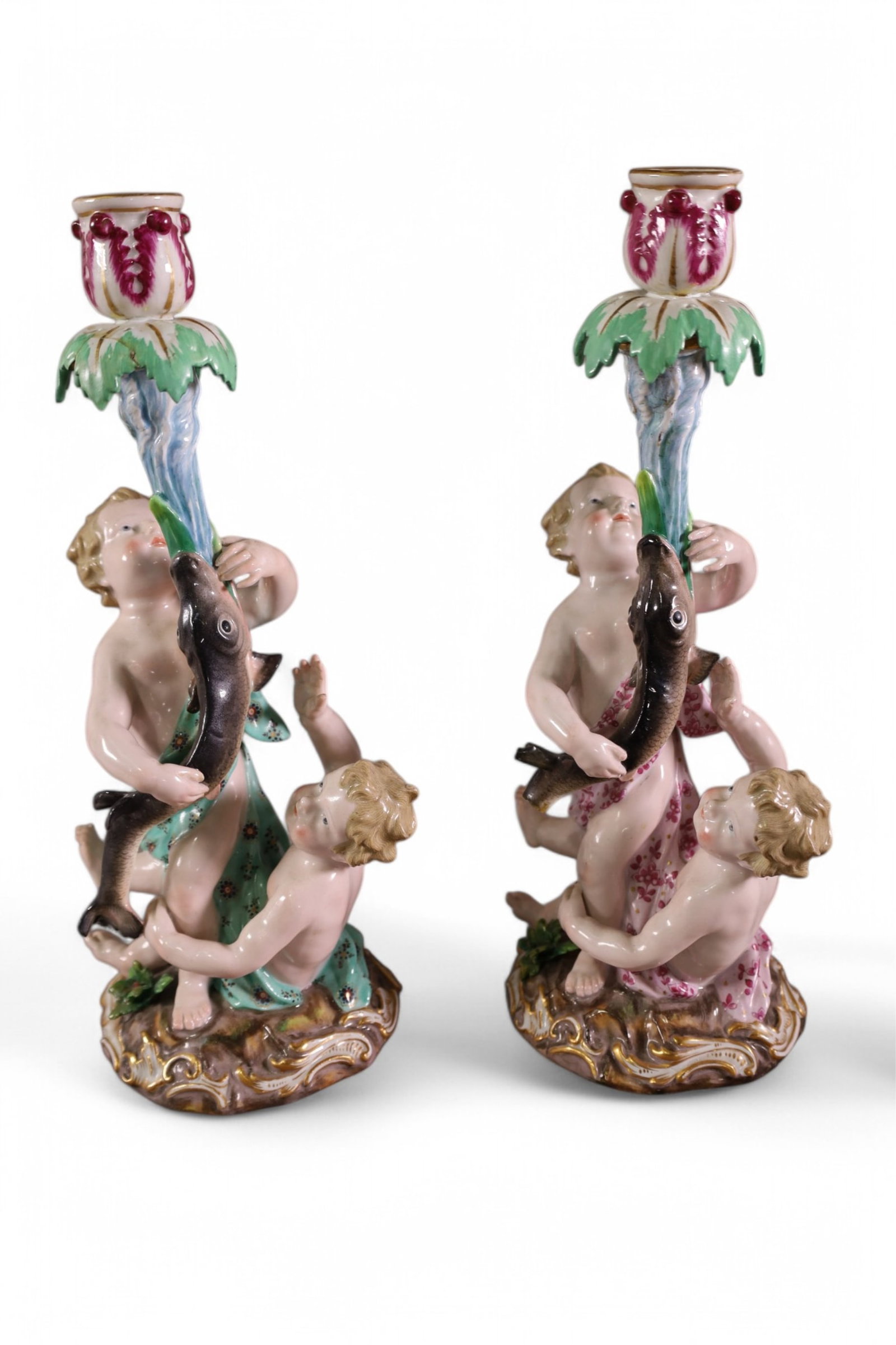 PAIR OF MEISSEN CANDELABRAS: PAIR OF MEISSEN PORCELAIN CANDELABRAS, FISH AND PUTTI DECORATED. REPAIRS. 12" H.