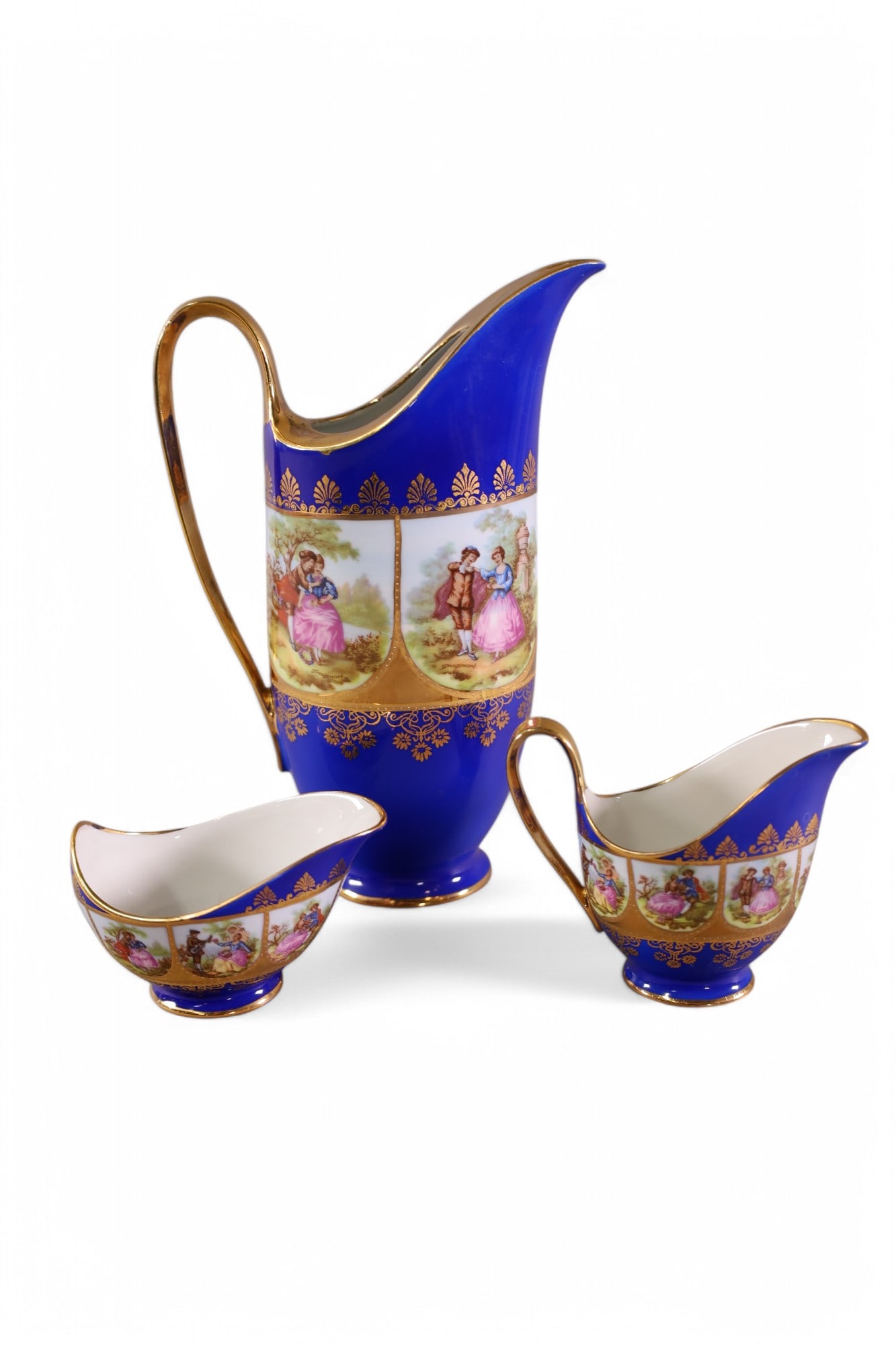 3 PIECE BAVARIAN PORCELAIN SET: PORCELAIN PITCHER, CREAMER & SUGAR. MARKED BAVARIA GERMANY. 9" H.