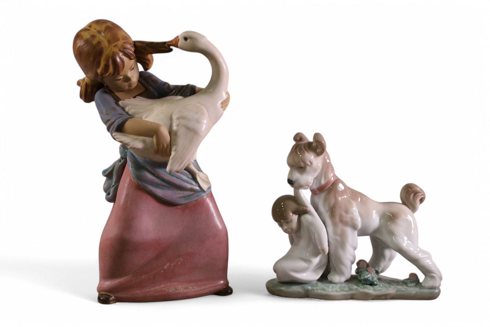 2 LLADRO FIGURES: 6656, SAFE AND SOUND LLADRO FIGURE, & 2095, DUCK PULLING PIGTAIL LLADRO. WITH BOXES. 6" & 9 1/2" H.