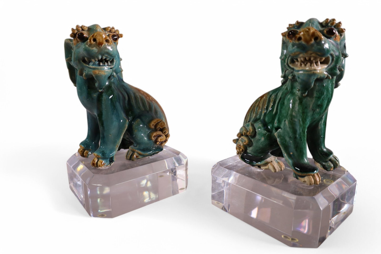 2 PORCELAIN FOO DOGS: PAIR OF PORCELAIN FOO DOGS ON LUCITE BASE, 8 1/2" H